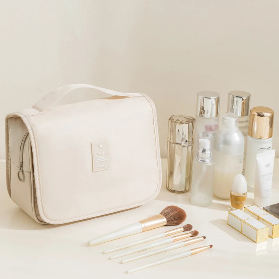 A multi-functional travel bag that can be hung with dry and wet separation, a hand-held toiletry and storage bag, one set